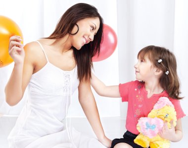 Woman and child playing clipart