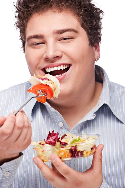 Obtloustlý muž s čerstvým salátem — Stock fotografie