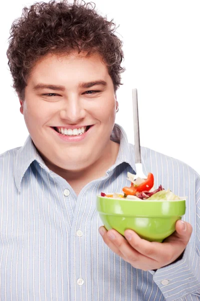 Molliger Mann mit frischem Salat — Stockfoto