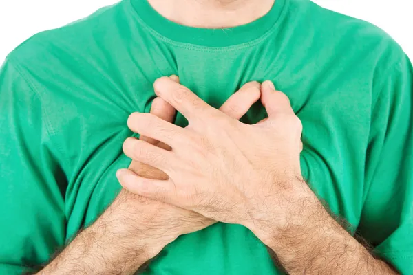 Both man's hands on breast because of hard breathing — Stock Photo, Image