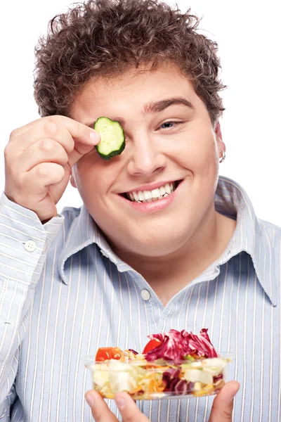 Chubby man with fresh salad — Stock Photo, Image