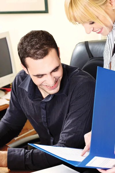 Manager with his employer in office checking document — Stock Photo, Image