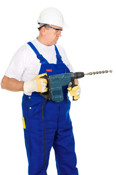 Man wearing worker suite holding drill for concrete — Stock Photo, Image