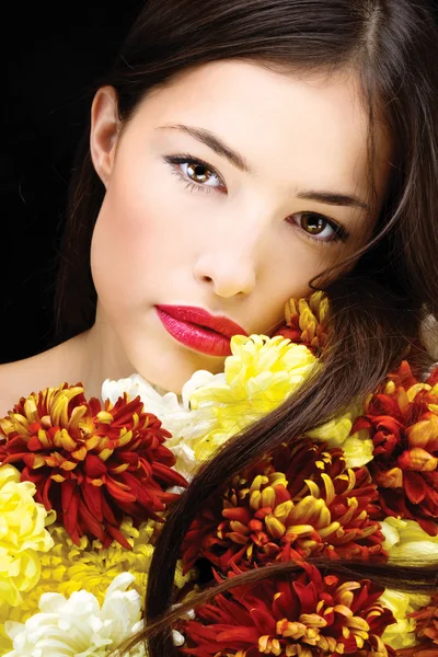 Donna con fiori — Foto Stock