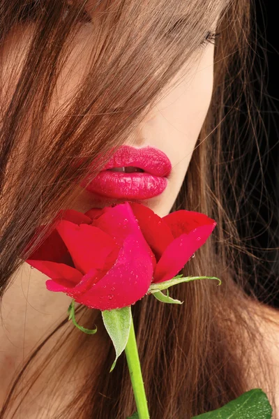 Woman's lips and red rose — Stock Photo, Image