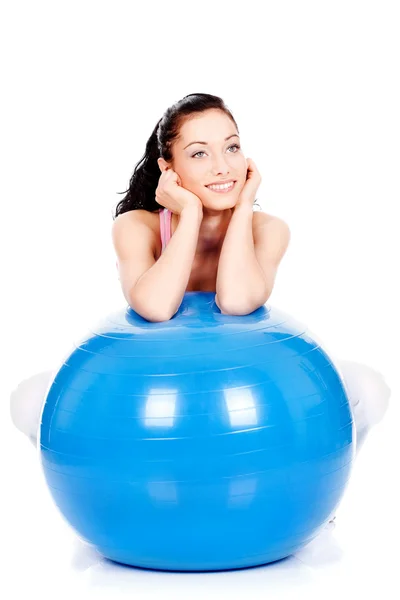 Woman behind the pilate ball — Stock Photo, Image