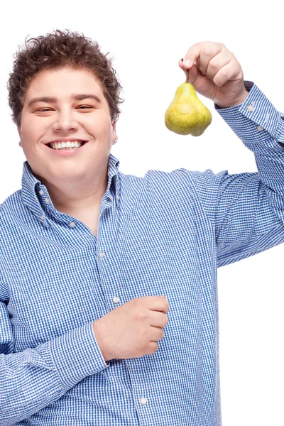 Chubby man holding pear — Stock Photo, Image