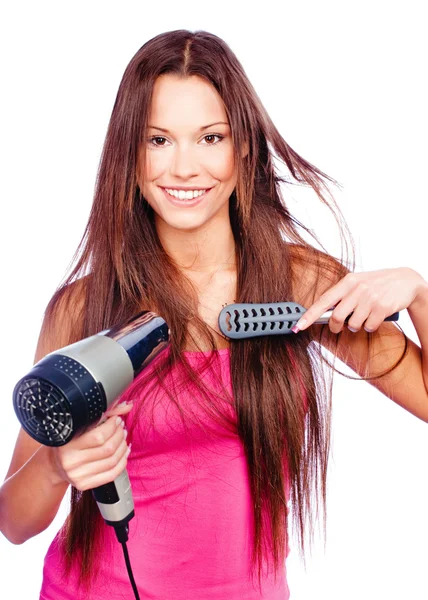 Mujer secador de pelo y peine —  Fotos de Stock
