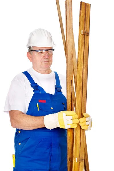 Worker holding boards — Stock Photo, Image