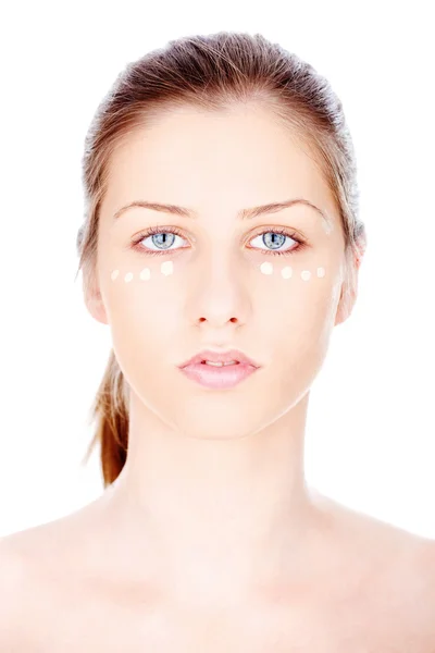 Liquid powder on woman's face — Stock Photo, Image