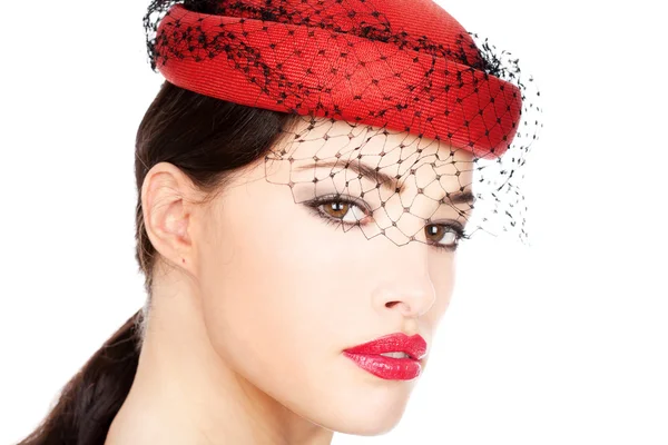 Kırmızı şapkalı kadın — Stok fotoğraf