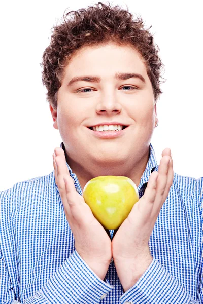 Paffuto uomo holding mela — Foto Stock