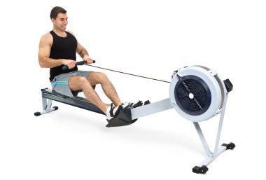 Man doing indoor rowing clipart