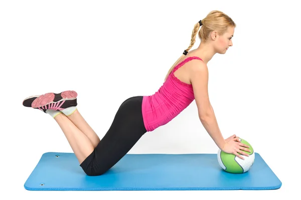 Female pushups on medicine ball — Stock Photo, Image