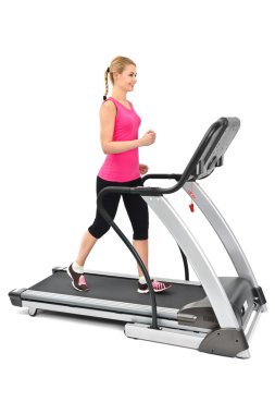 Young woman doing exercises on treadmill clipart