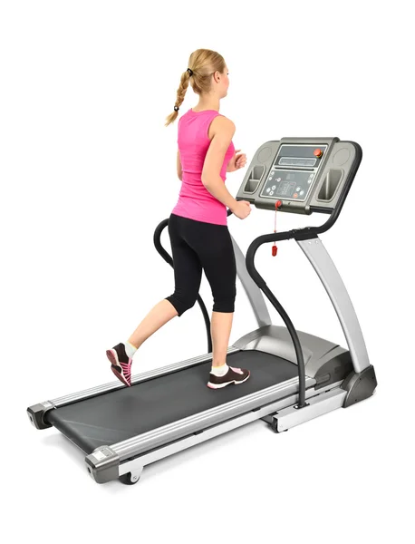 Young woman doing exercises on treadmill — Stock Photo, Image