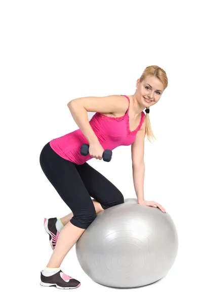 Standing Bent-Over Dumbbell Triceps Extension on Fitnes Ball, ph — Stock Photo, Image