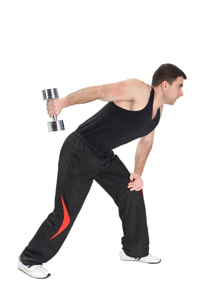 De pie mancuerna de un brazo tríceps extensiones en Fitnes Ball, pha —  Fotos de Stock