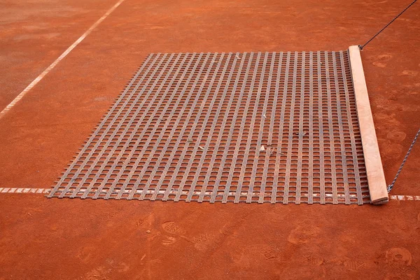Čištění tenisový kurt — Stock fotografie