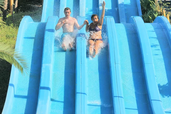 Man and woman in water park — Stock Photo, Image