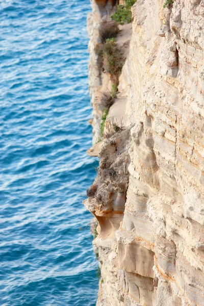 Sandy rock by the sea — Stock Photo, Image