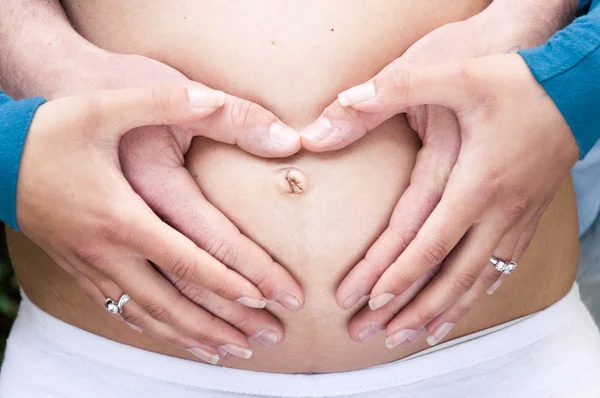 Barriga da mulher grávida — Fotografia de Stock