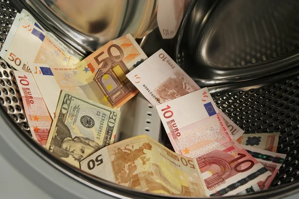 stock image Money in washing machine