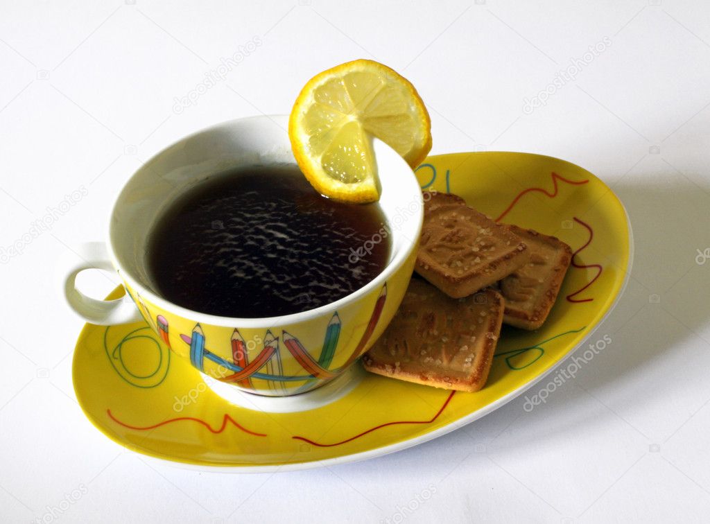 Happy cup of tea with cookies