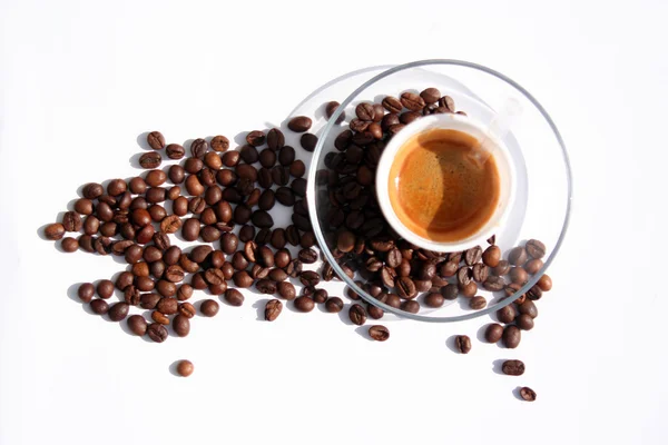 Plastic cup with espresso and coffee beans for break time at office — Stock Photo, Image