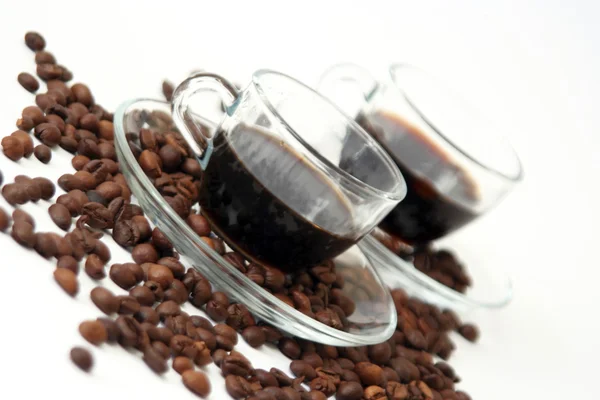stock image Coffee cups with coffee beans