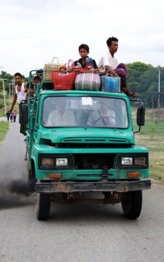 Overload and pollutant car in Myanmar clipart