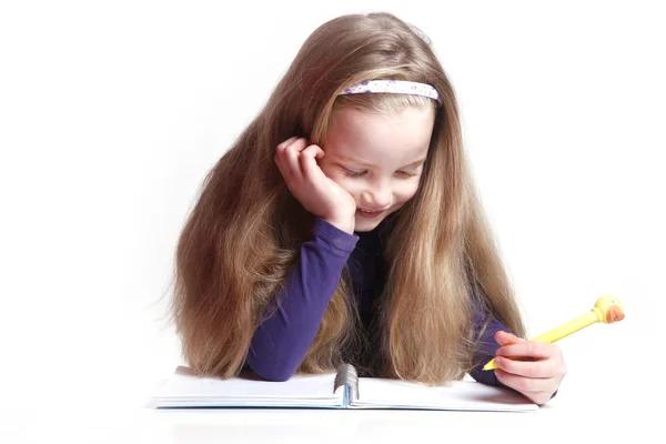 Young girl writing — Stock Photo, Image