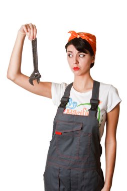 Irresolute girl with spanner clipart