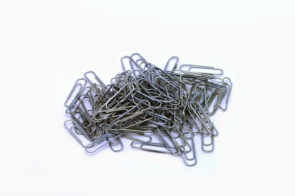 stock image Writing paper clips on a white background