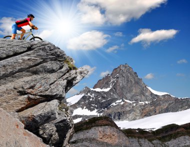 Biker in the Swiss Alps clipart