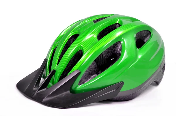 Green bicycle cross country plastic helmet — Stock Photo, Image