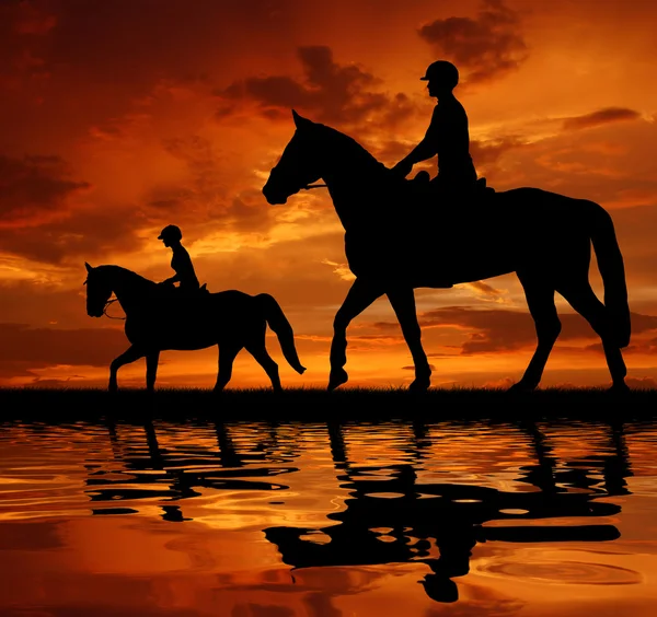 Renners op een paard — Stockfoto