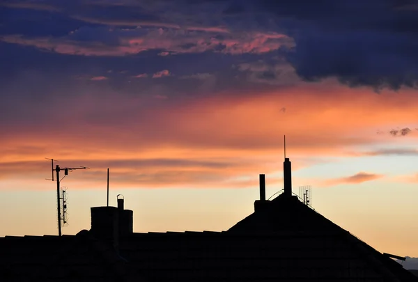 stock image Sunset above houses