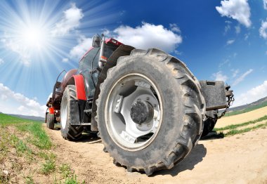 Tractor in the field clipart