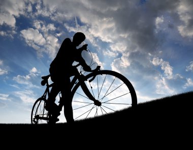Silhouette of the cyclist clipart