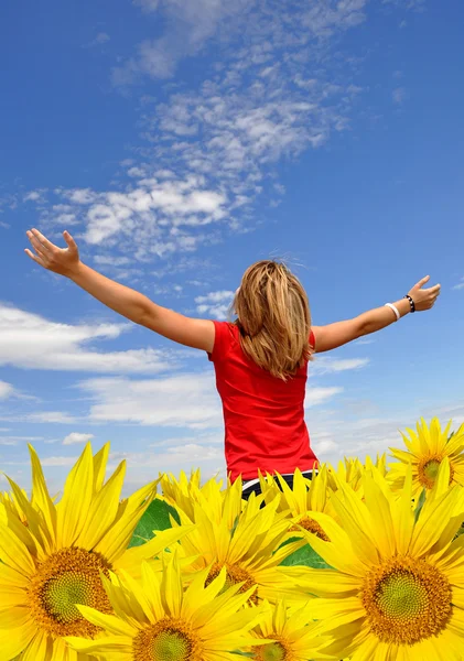 The girl in a sunflower field — Stock Photo, Image