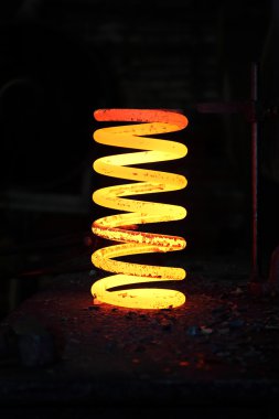 Incandescent iron spring from some heavy wehical clipart