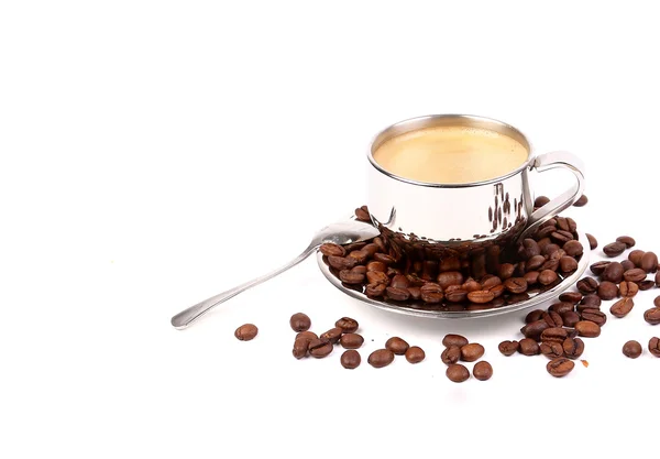 Metal Cup of espresso coffee with spoon and seeds — Stock Photo, Image