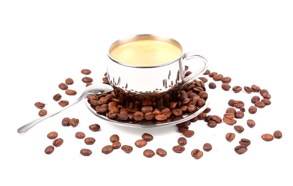 Metal Cup of espresso coffee with spoon and seeds — Stock Photo, Image