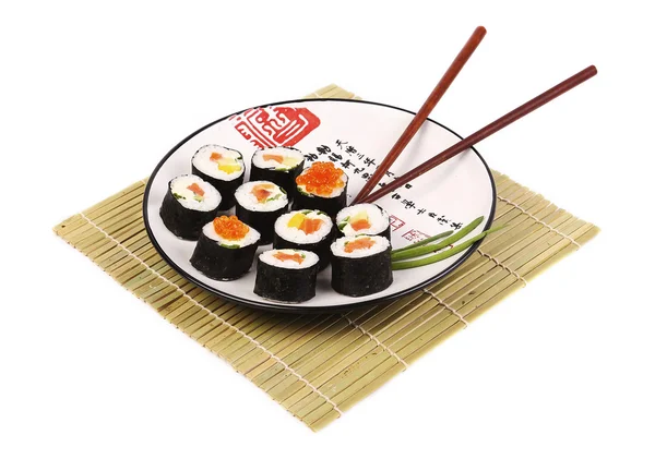 Sushi rolls on a white plate — Stock Photo, Image