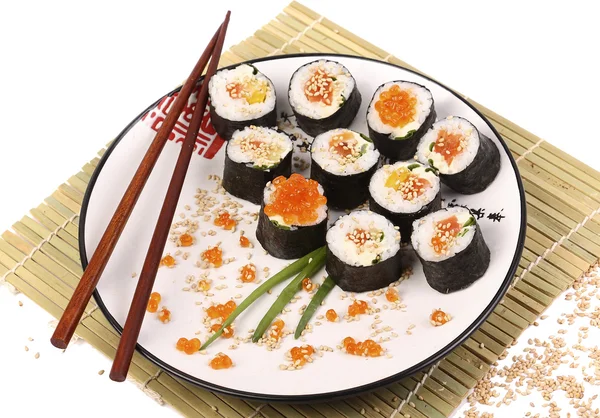 Sushi rolls on a white plate — Stock Photo, Image