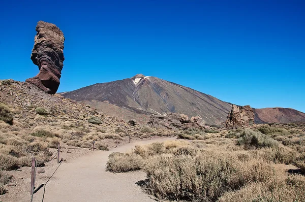 Teide Vulkan with rock and road — Stok fotoğraf