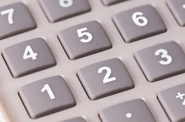 Een geïsoleerde knipsel van een rekenmachine-toetsenbord — Stockfoto
