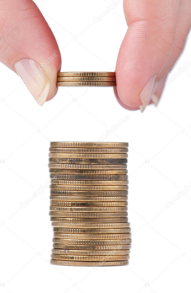 Women finger put coins on coin-stack isolated on white