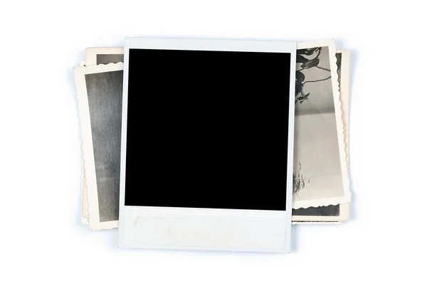 Stapel oude foto 's op witte achtergrond — Stockfoto